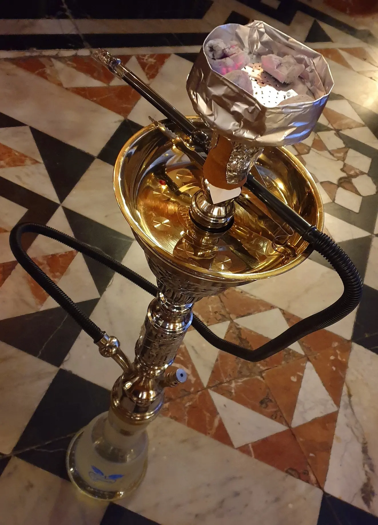 A hookah, also known as a shisha or a waterpipe, utilises water filtration and is frequently used to smoke tobacco mixed with flavouring, fruit or other ingredients. I used this particular device in a restaurant in the middle-east